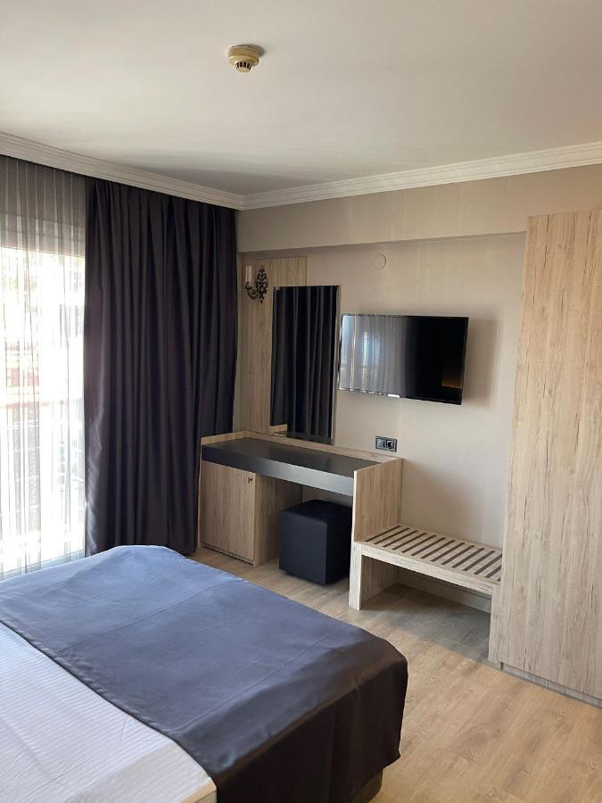 Grand Faik Hotel Cesme Bagian luar foto