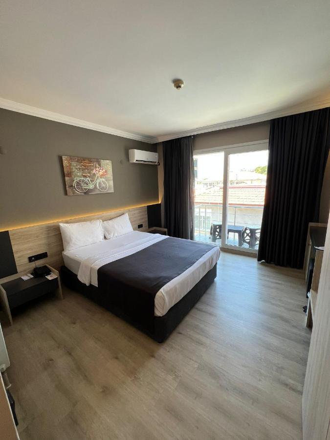 Grand Faik Hotel Cesme Bagian luar foto
