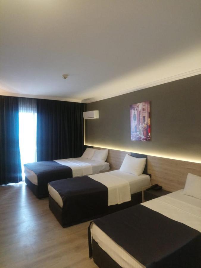 Grand Faik Hotel Cesme Bagian luar foto