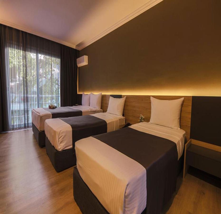 Grand Faik Hotel Cesme Bagian luar foto