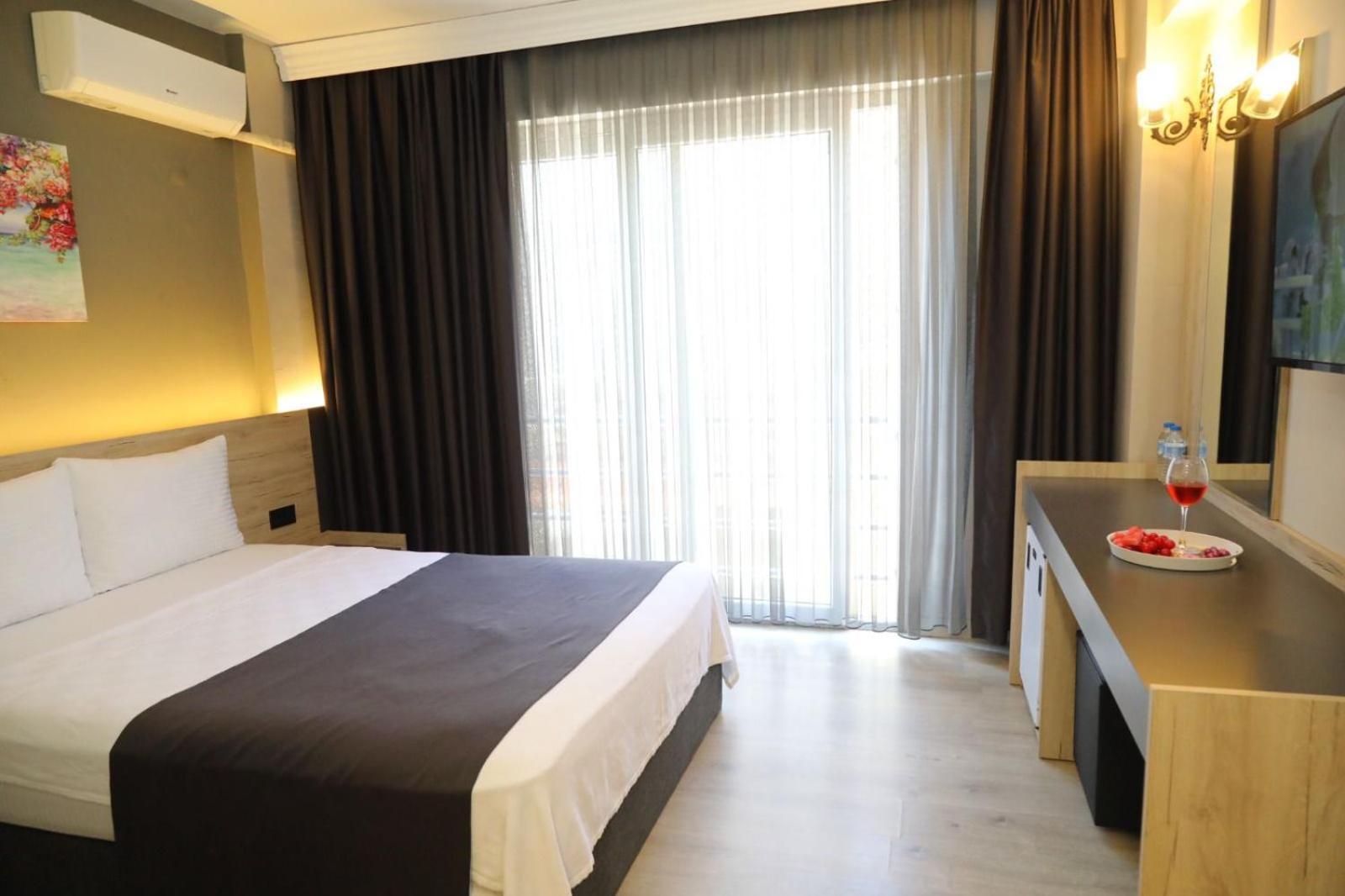 Grand Faik Hotel Cesme Bagian luar foto