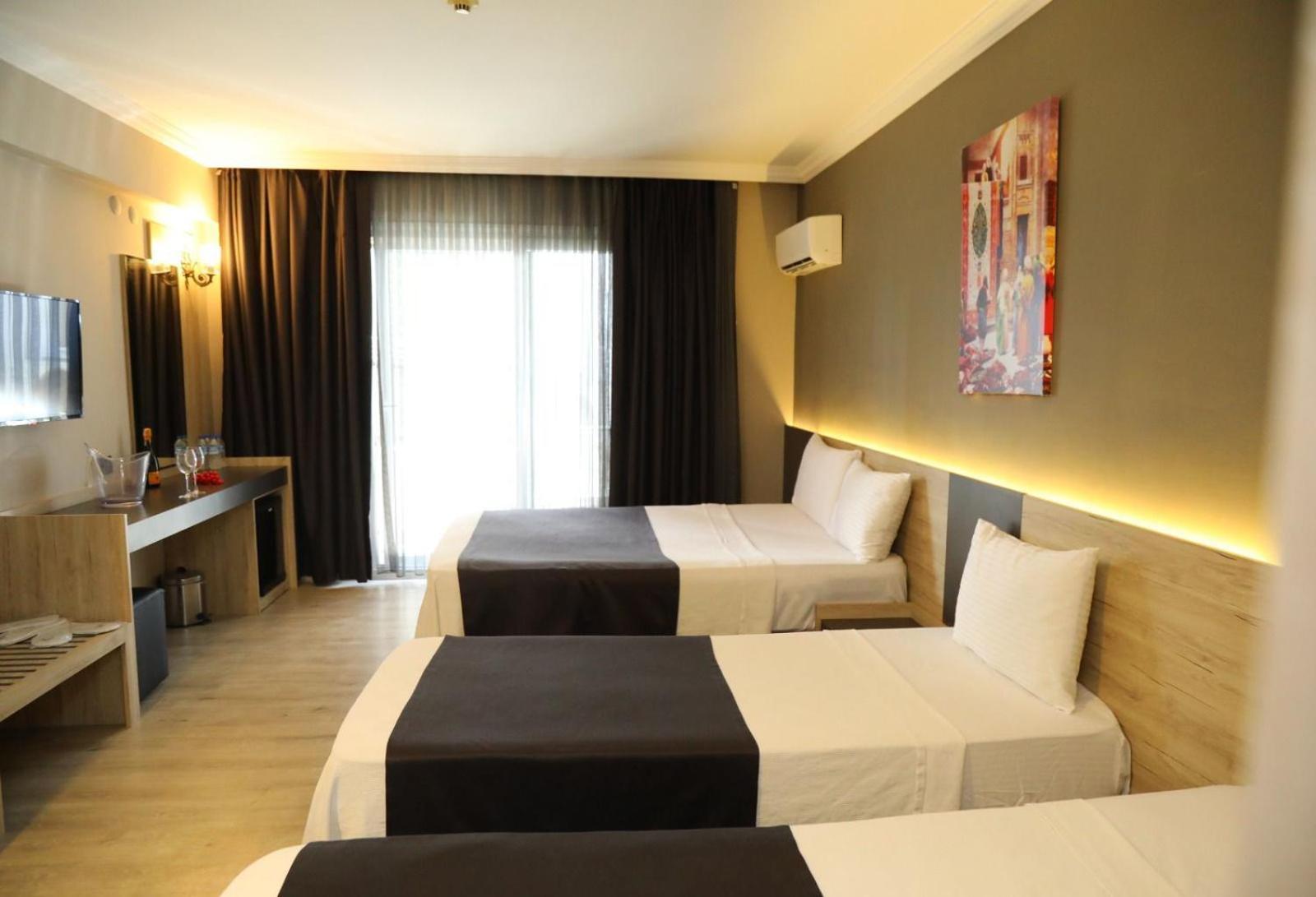 Grand Faik Hotel Cesme Bagian luar foto